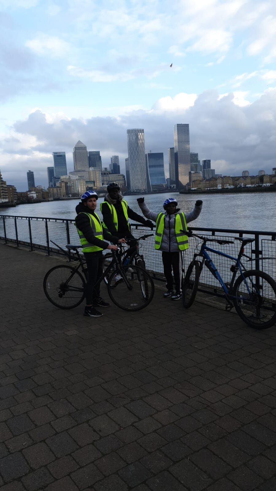 A cycle ride along the river with the London skyline behind