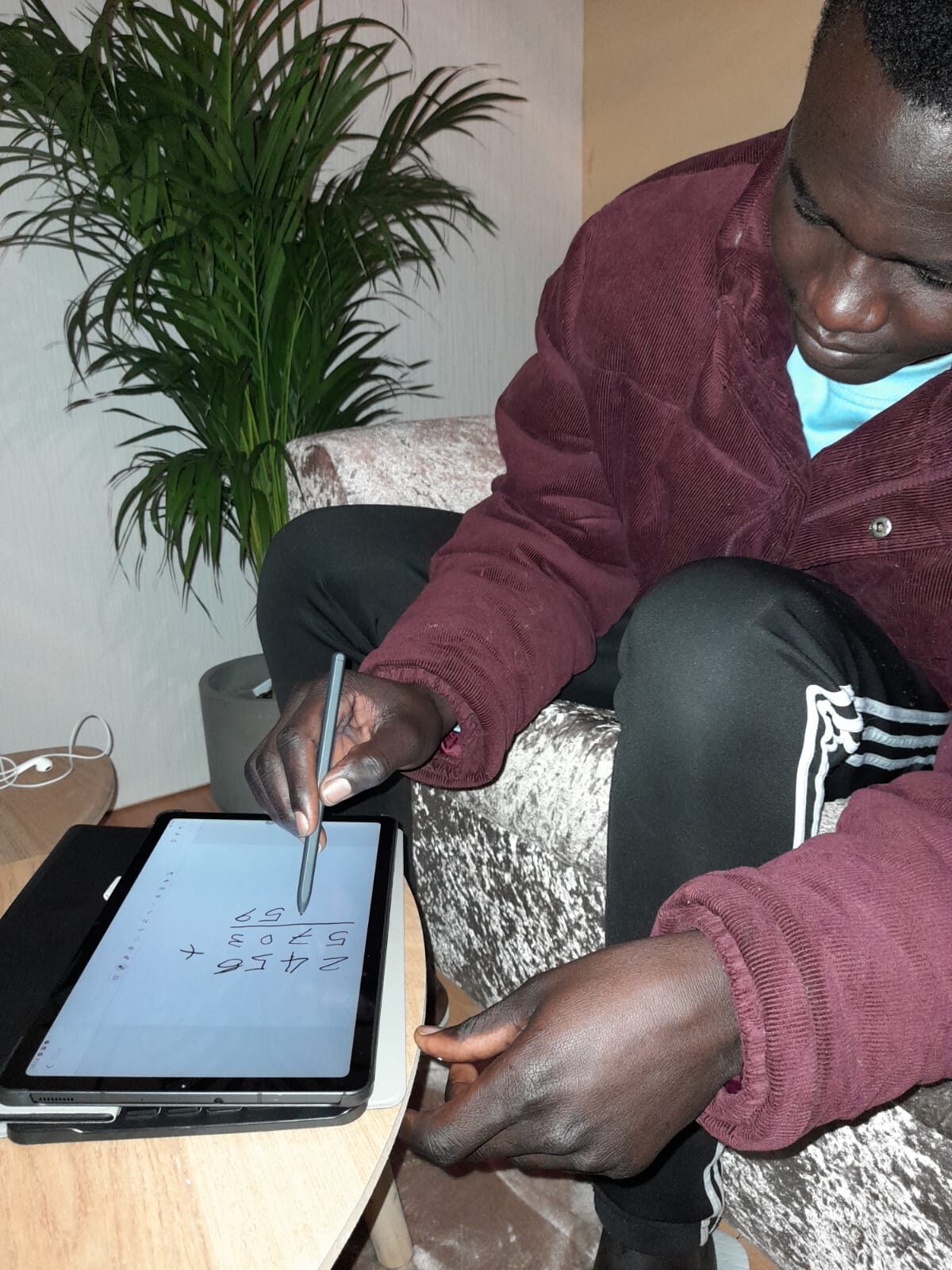 Working through coursework on a tablet